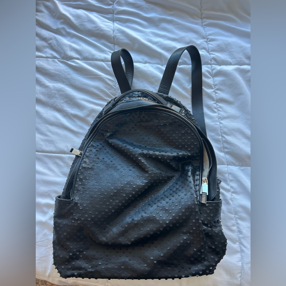 Calvin Klein Platinum perforated backpack